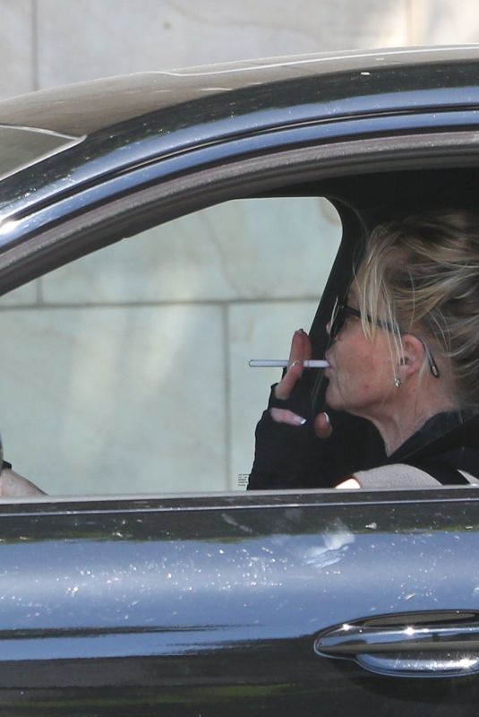 MELANIE GRIFFITH Driving Out from Gym Session in Los Angeles 06/24/2021