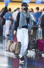 OLIVIA WILDE Arrives at JFK Airport in New York 06/28/2021