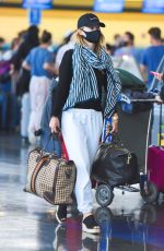 OLIVIA WILDE Arrives at JFK Airport in New York 06/28/2021