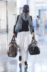 OLIVIA WILDE Arrives at JFK Airport in New York 06/28/2021