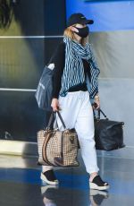 OLIVIA WILDE Arrives at JFK Airport in New York 06/28/2021