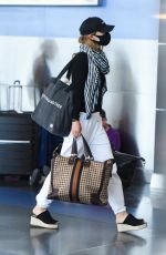 OLIVIA WILDE Arrives at JFK Airport in New York 06/28/2021