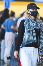 OLIVIA WILDE Arrives at JFK Airport in New York 06/28/2021