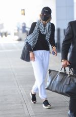 OLIVIA WILDE Arrives at JFK Airport in New York 06/28/2021