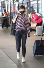 OLIVIA WILDE Arrives at LAX Airport in Los Angeles 06/20/2021