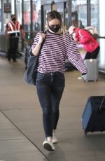 OLIVIA WILDE Arrives at LAX Airport in Los Angeles 06/20/2021