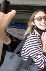 OLIVIA WILDE Arrives at LAX Airport in Los Angeles 06/20/2021