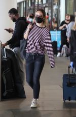 OLIVIA WILDE Arrives at LAX Airport in Los Angeles 06/20/2021