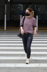 OLIVIA WILDE Arrives at LAX Airport in Los Angeles 06/20/2021
