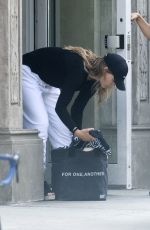 OLIVIA WILDE Leaves Her Hotel in New York 06/28/2021