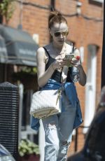 PHOEBE DYNEVOR in Ripped Denim Out in London 05/31/2021