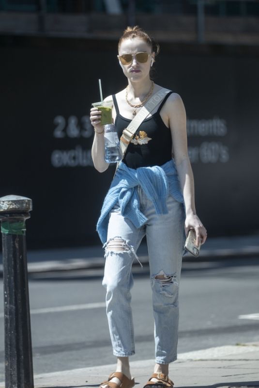 PHOEBE DYNEVOR in Ripped Denim Out in London 05/31/2021
