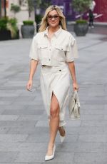 ASHLEY ROBERTS in a Bleached Denim Skirt Arrives at Heart Radio in London 07/07/2021