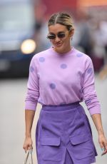 ASHLEY ROBERTS in a Purple Mini Skirt and Polka Dot Top at Heart Radio in London 07/13/2021