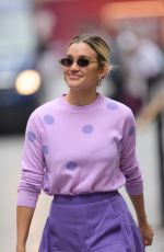 ASHLEY ROBERTS in a Purple Mini Skirt and Polka Dot Top at Heart Radio in London 07/13/2021