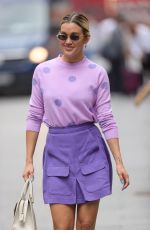 ASHLEY ROBERTS in a Purple Mini Skirt and Polka Dot Top at Heart Radio in London 07/13/2021