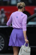 ASHLEY ROBERTS in a Purple Mini Skirt and Polka Dot Top at Heart Radio in London 07/13/2021