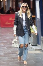 ASHLEY ROBERTS in Ripped Denim Arrives at Heart Radio in London 07/12/2021