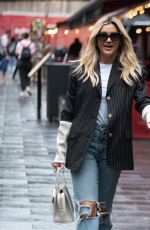 ASHLEY ROBERTS in Ripped Denim Arrives at Heart Radio in London 07/12/2021