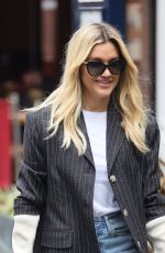 ASHLEY ROBERTS in Ripped Denim Arrives at Heart Radio in London 07/12/2021