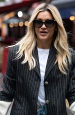 ASHLEY ROBERTS in Ripped Denim Arrives at Heart Radio in London 07/12/2021