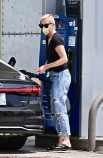 CHARLIZE THERON in Ripped Demim at a Gas Station in West Hollywood 07/24/2021