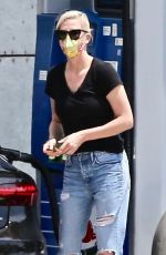 CHARLIZE THERON in Ripped Demim at a Gas Station in West Hollywood 07/24/2021