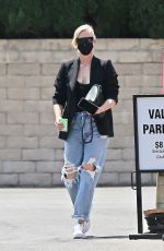 CHARLIZE THERON in Ripped Denim Out Shopping in Beverly Hills 07/16/2021