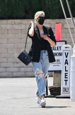 CHARLIZE THERON in Ripped Denim Out Shopping in Beverly Hills 07/16/2021