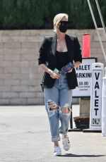 CHARLIZE THERON in Ripped Denim Out Shopping in Beverly Hills 07/16/2021