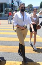 CHRISSY TEIGEN Out Shopping for Sunglasses in West Hollywood 07/20/2021