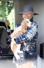 CHRISSY TEIGEN Out with Her New Dog in Santa Monica 07/28/2021