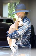 CHRISSY TEIGEN Out with Her New Dog in Santa Monica 07/28/2021