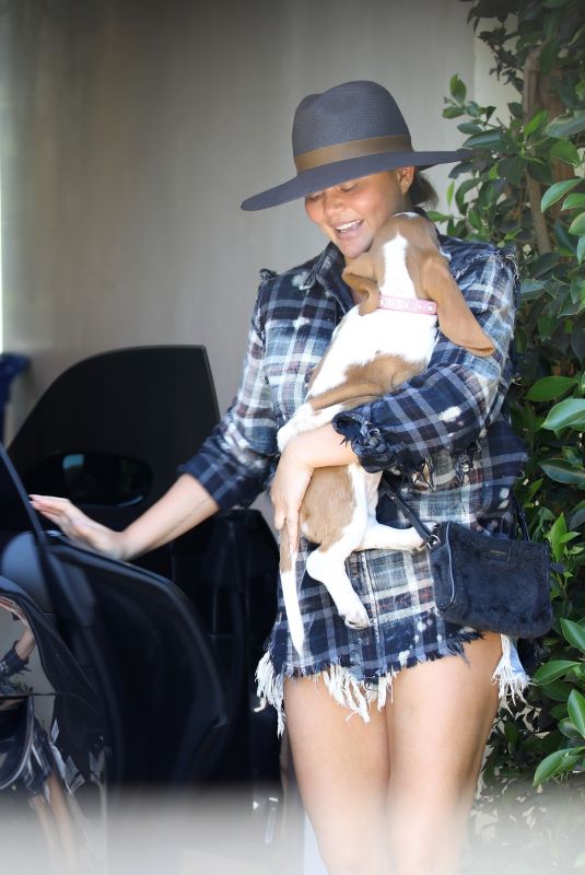CHRISSY TEIGEN Out with Her New Dog in Santa Monica 07/28/2021