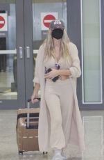 COURTNEY STODDEN and Chris Sheng Arrives in Washington 07/20/2021