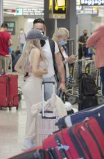 COURTNEY STODDEN and Chris Sheng Arrives in Washington 07/20/2021
