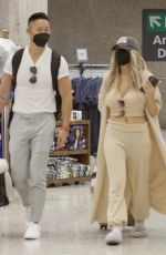 COURTNEY STODDEN and Chris Sheng Arrives in Washington 07/20/2021