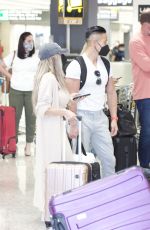 COURTNEY STODDEN and Chris Sheng Arrives in Washington 07/20/2021