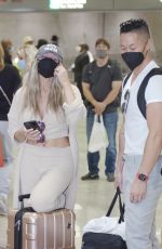COURTNEY STODDEN and Chris Sheng Arrives in Washington 07/20/2021