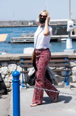 KAROLINA KURKOVA Arrives in Capri at UNICEF Italia and LuisaViaRoma Summer Gala 07/30/2021