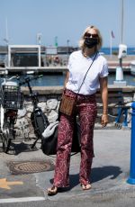 KAROLINA KURKOVA Arrives in Capri at UNICEF Italia and LuisaViaRoma Summer Gala 07/30/2021
