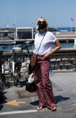 KAROLINA KURKOVA Arrives in Capri at UNICEF Italia and LuisaViaRoma Summer Gala 07/30/2021