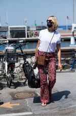 KAROLINA KURKOVA Arrives in Capri at UNICEF Italia and LuisaViaRoma Summer Gala 07/30/2021