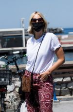 KAROLINA KURKOVA Arrives in Capri at UNICEF Italia and LuisaViaRoma Summer Gala 07/30/2021