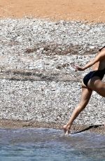 KATE HUDSON in Swimsuit at a Beach in Greece 07/03/2021