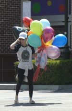 KATE MARA Picks up Balloons to Celebrate Her Stepson