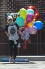 KATE MARA Picks up Balloons to Celebrate Her Stepson