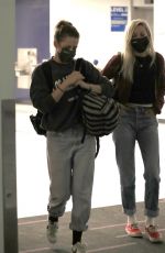 KRISTEN STEWART and DYLAN MEYER at LAX Airport in Los Angeles 07/09/2021