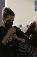 KRISTEN STEWART and DYLAN MEYER at LAX Airport in Los Angeles 07/09/2021