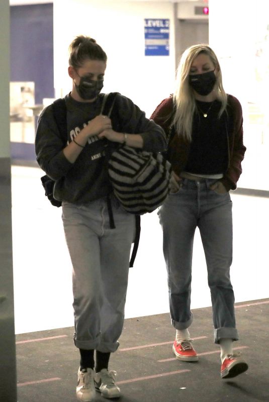 KRISTEN STEWART and DYLAN MEYER at LAX Airport in Los Angeles 07/09/2021